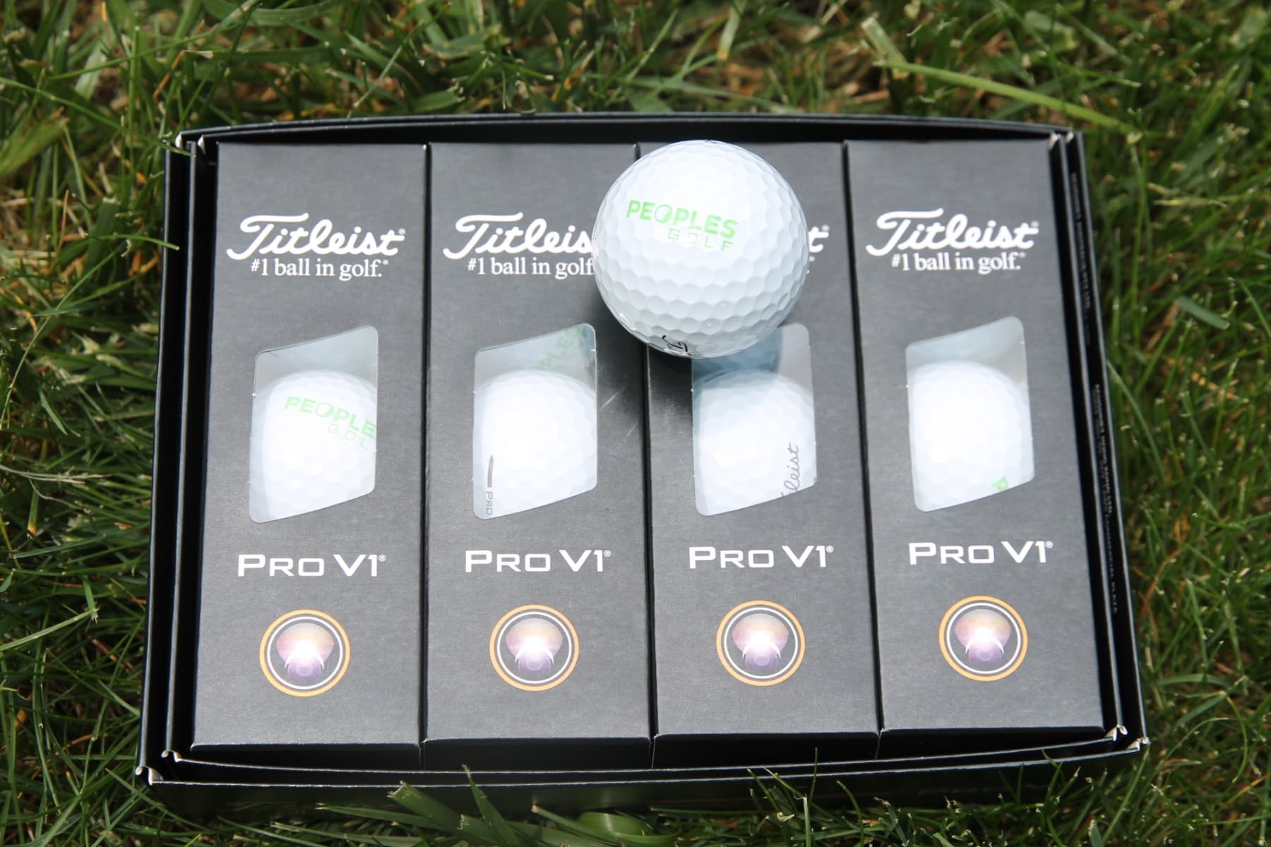 Dozen of "Peoples Golf" Titleist ProV1 